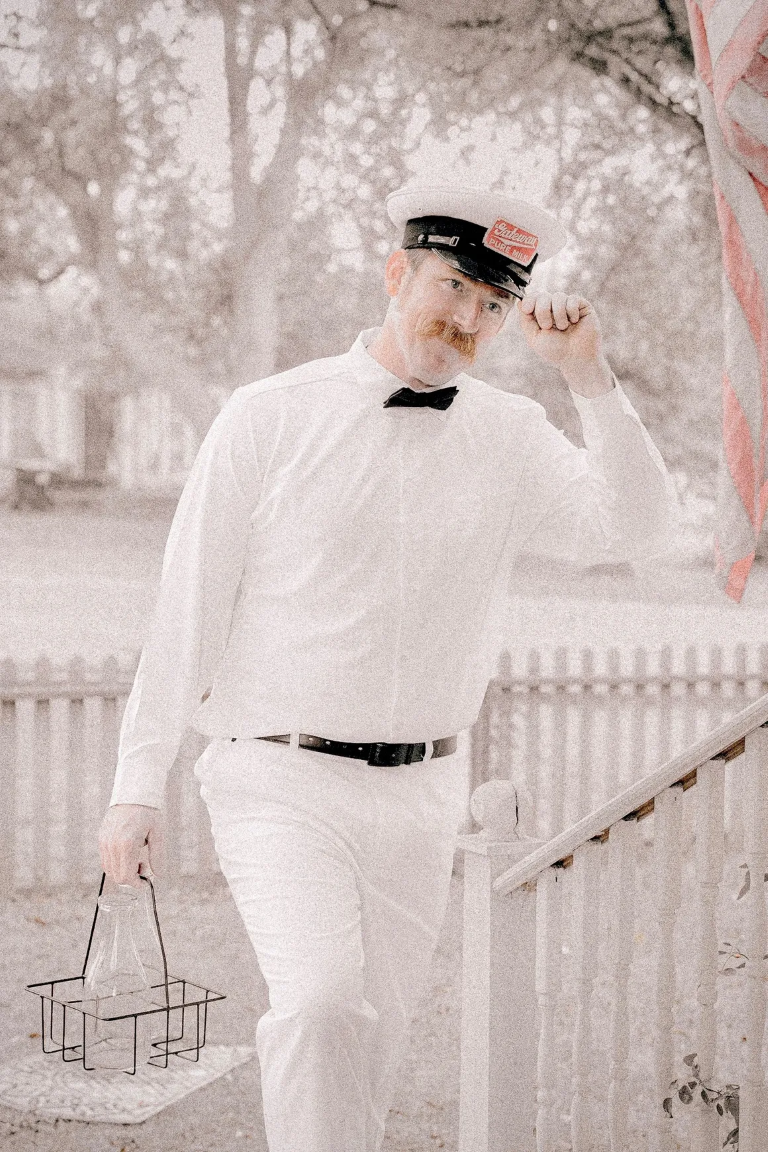 Performer in authentic 1930s milkman costume